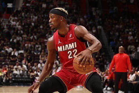 Jimmy Butler #22 of the Miami Heat dribbles the ball during the game against the Portland Trail Blazers on 21 January 2025 at Kaseya Center in Miami, Florida