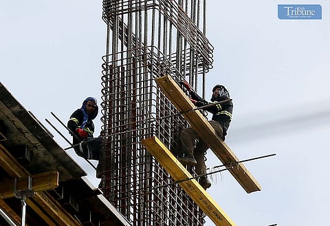 Workers were seen working at the top of a building under construction in Kamuning, Quezon City, and the House of Representatives is expediting deliberations to push for a P200 wage increase, according to House Speaker Martin Romualdez. The announcement came one day after a meeting with labor groups on Tuesday, January 28.
