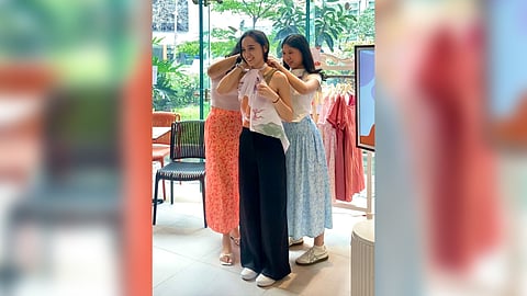 Andrea and Sadie demonstrate ways to style Loca’s iconic scarf.