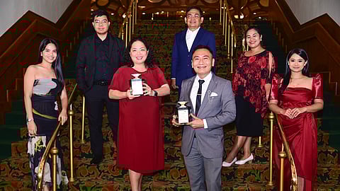 Receiving two Silver Awards at The Manila Hotel on 28 January 2025 are (center, from left) SMFI Education Programs SAVP Eleanor Lansang, Corporate Affairs and Sustainability SAVP Victor Chan and team members of the SM Foundation.