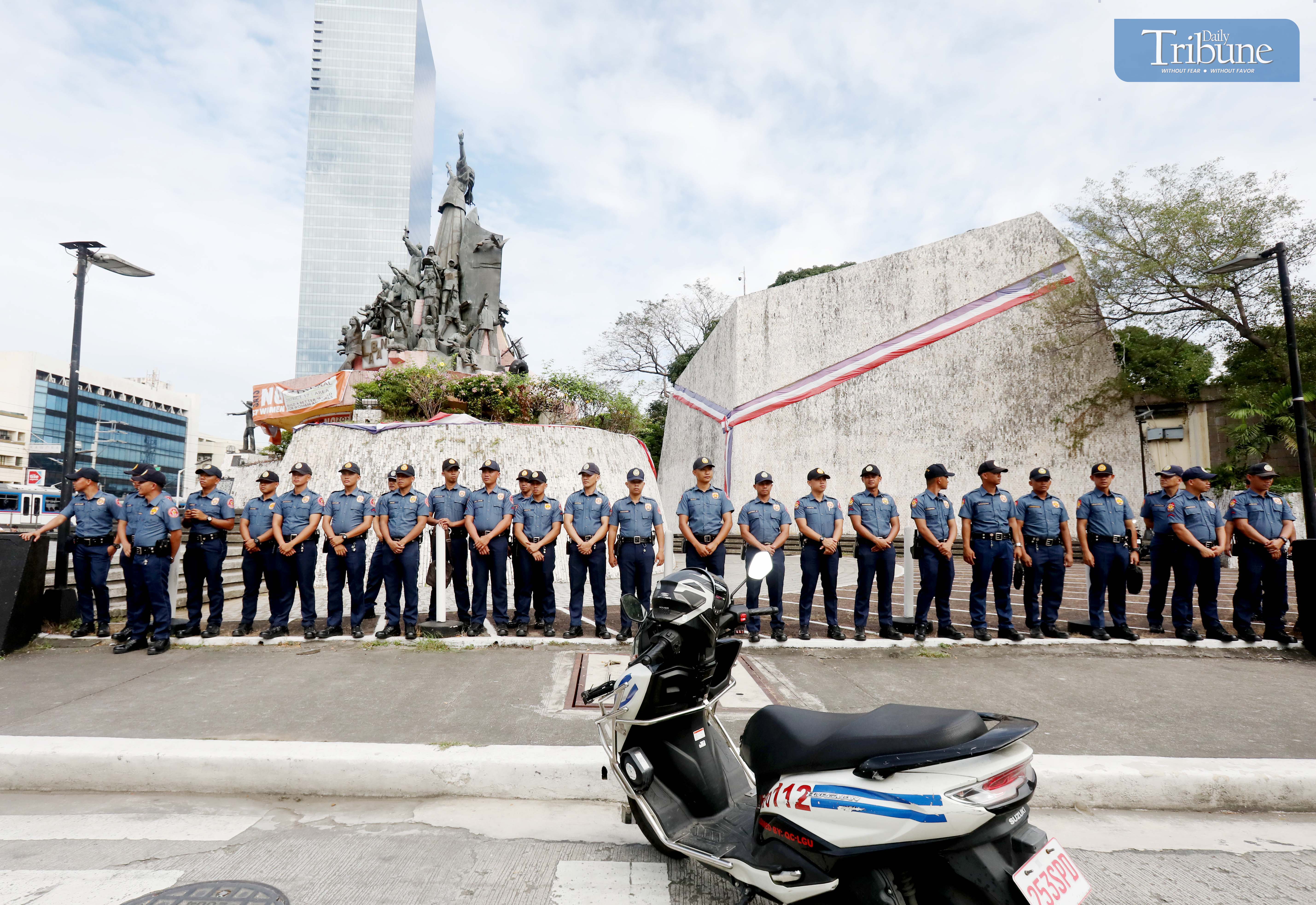 (January 31 2025) Members of the Philippine National Police (PNP) guarded the perimeter and ensured security around the EDSA People Power Monument in Quezon City on Friday, January 31, 2025, following a rally organized by various militant groups. To call for the impeachment of Vice President Sara Duterte. Photo/Analy Labor