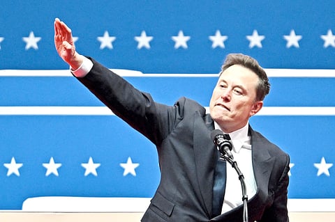 ELON Musk gestures as he speaks during the inaugural parade.