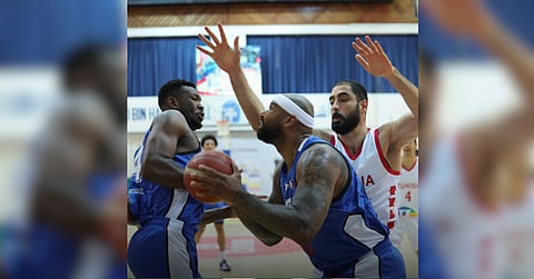 DeMarcus Cousins of Strong Group Athletics makes his move in the controversial semis showdown with the Tunisian national team on Sunday in the 34th Dubai International Basketball Championship.