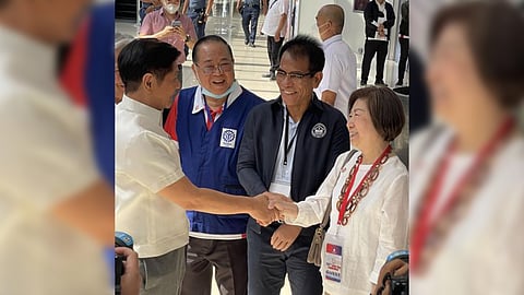 At the biggest job fair yet at the SMX Convention Center, SM Investments Corp. vice chairperson Tessie Sy-Coson (right) welcomes President Ferdinand Marcos Jr. (left). With them are Technical Education and Skills Development Authority director general Danilo Cruz (second from left) and Department of Human Settlements and Urban Development Secretary Jose Acuzar (third from left).