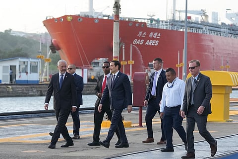 U.S. Secretary of State Marco Rubio (4th-L) talks to Panama Canal Authority Administrator Ricaurte Vasquez (L) during a tour at the Miraflores locks of the Panama Canal in Panama City on February 2, 2025.