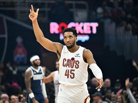 Cleveland's Donovan Mitchell celebrates during the first quarter of the Cavaliers' blowout NBA victory over the Dallas Mavericks