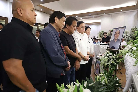 Former President Rodrigo Duterte, along with Senators Bong Go and Ronald dela Rosa, visits the wake of Julia Flori Monzon Po at The Heritage Park in Taguig City on Sunday. Po was the pilot of a helicopter that crashed into a creek in Barangay San Miguel, Guimba, Nueva Ecija, on 1 February.