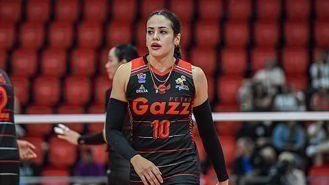 Brooke Van Sickle of Petro Gazz struggles against the Zus Coffee defense during their PVL All-Filipino Conference match late Tuesday. The Angels prevailed, 25-20, 24-26, 28-26, 25-20.