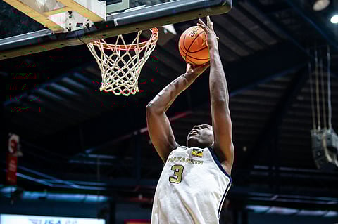 Collins Akowe and the NUNS Bullpups preserve their perfect slate following a 78-77 win over the UE Junior Warriors in the UAAP Season 87 high school boys’ basketball tournament.