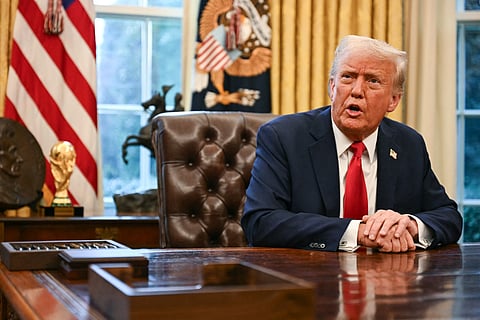 President Donald Trump speaks to the press after signing an executive order to create a US sovereign wealth fund, in the Oval Office of the White House, Feb. 3, 2025, in Washington.