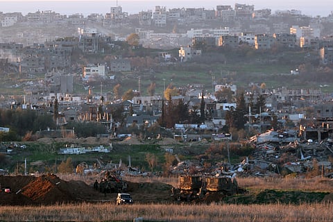 This picture taken from the Israeli side of the border with the Gaza Strip shows troops stationed at the border, on January 20, 2025, following a ceasefire deal a day earlier between Israel and the Palestinian Hamas group.