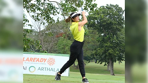 HAZEL Ann Grecia watches her tee shot on the 11th hole at Alabang Country Club during Day 7 of the 37th Mango Tee Invitational on Friday.