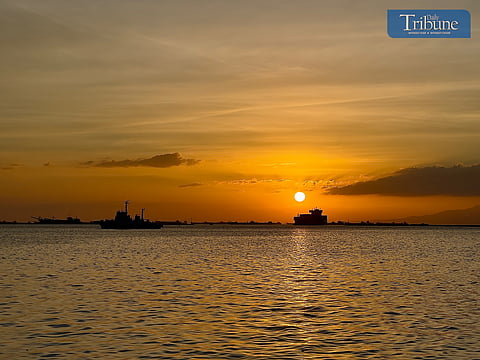 A vibrant sunset over Manila Bay