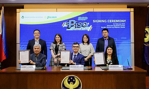 Under the witness of Bangko Sentral ng Pilipinas top officials, Palawan Group of Companies executives signed the contract to strengthen their support for the BSP Piso Caravan.
