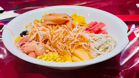 At the heart of the shared Chinese New Year celebrations with the Philippines and Malaysia was the Yusheng, a vibrant dish of shredded vegetables, sauces, and crispy toppings, over which guests raised their chopsticks for the traditional prosperity toss (lo hei).