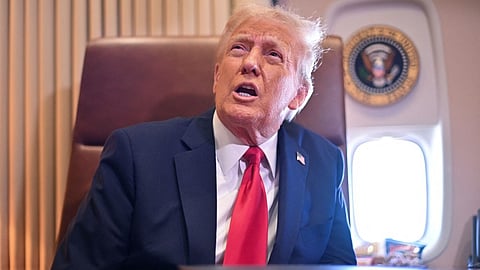 US President Donald Trump speaks to the press after signing a proclamation renaming the Gulf of Mexico as the Gulf of America aboard Air Force One, as it flies over the Gulf enroute to New Orleans, Louisiana on 9 February 2025.