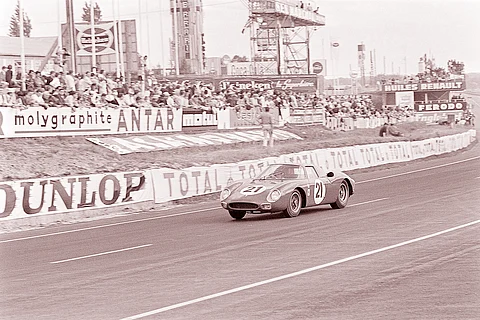 Masten Gregory and Jochen Rindt ride to victory on 20 June 1965 in Le Mans during the 33rd edition of the 24 hours of Le Mans endurance car race.