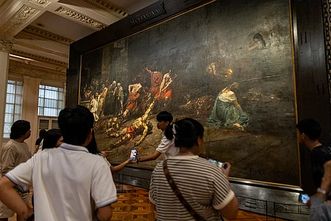Museum goers explore the National Museum of Fine Arts along Padre Burgos Street in Manila on Saturday, 4 January.