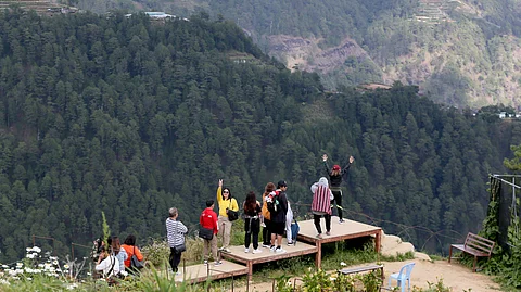 LOCAL tourists enjoy the view of the mountain in Atok, Benguet, one of the highest and coldest places in the Philippines. Temperature in Baguio City dipped to 14.6 degrees Celsius on Sunday as the northeast monsoon continues to affect the country.