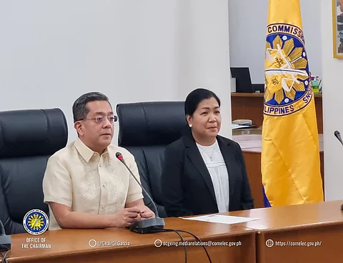 Comelec Chair George Garcia and Comelec Law Department Chief Maria Norina Tangaro-Casingal