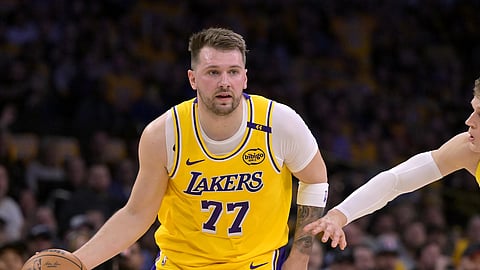Luka Dončić of the Los Angeles Lakers goes up against Utah Jazz’s Lauri Markkanen during first-quarter action at the Crypto.com Arena on 10 February 2025 (US time).