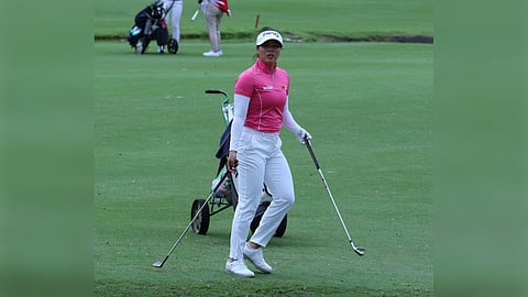 Pauline del Rosario proceeds to the tee mound of hole No. 5 at The Country Club during the start of the Philippine Ladies Masters in Sta. Rosa, Laguna on Wednesday.