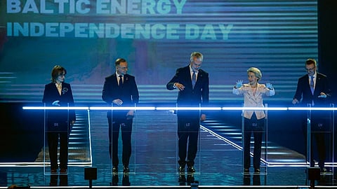 Estonian Minister of Climate Yoko Alender, Polish President Andrzej Duda, Lithuanian President Gitanas Nauseda, European Commission President Ursula von der Leyen and Latvian President Edgars Rinkevics stand behind lights symbolising the Baltic states disconnecting from the Moscow-controlled energy grid and joining the European power grid at the event "Baltic Energy Independence Day" at the Litexpo Exhibition Center in Vilnius, Lithuania on 9 February 2025.