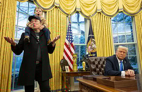 Tesla and SpaceX CEO Elon Musk with his son X Æ A-Xii join US President Donald Trump as he signs executive orders in the Oval Office of the White House in Washington, DC, 11 February 2025. Tech billionaire Elon Musk, who has been tapped by President Donald Trump to lead federal cost-cutting efforts, said the United States would go "bankrupt" without budget cuts.
