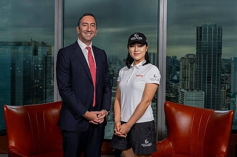 Cyrus Sherafat (left), Executive Vice President at Solaire Resorts, welcomes Golfer Ina Yoon (right) to Solaire Resort North during an exclusive contract signing event signifying a two-year brand ambassadorship deal.