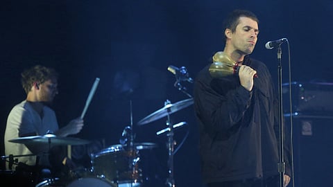 This picture taken on January 14, 2018 shows English singer, songwriter and formerly the lead singer of the rock band Oasis Liam Gallagher, performing at a concert in Jakarta.