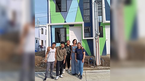 Dream come true Amado ‘Mhadz’ Diwata (leftmost) took a picture with his family, namely (from left), Justine Mhadz, Ma. Aubrey Zhen, Janreighn Zaimone and wife Noveliza, in their dream house in Naic, Cavite, acquired via Pag-IBIG Fund Home Mortgage Financing.