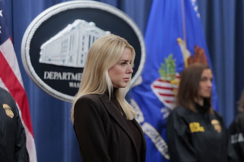 U.S. Attorney General Pam Bondi listens during a news conference at the Department of Justice Building on 12 February 2025 in Washington, DC. Bondi held the news conference to announce charges against the state of New York for failure to enforce federal immigration laws.