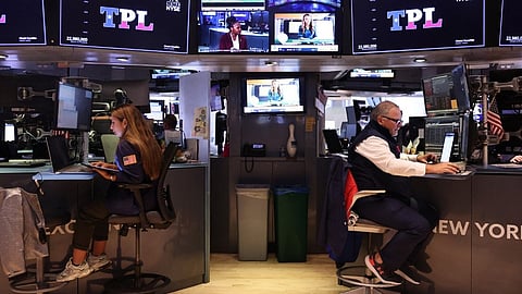 Stocks began to slip after the opening bell as the market awaits key inflation data after a week of volatility amid a global market sell-off centered around fears of a U.S. recession.