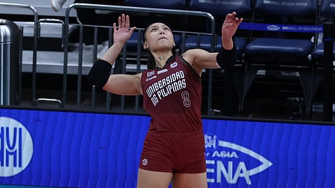 Joan Monera helps University of the Philippines edge the University of the East, 25-15, 25-19, 24-26, 13-25, 15-13 on Saturday at the start of Season 87 UAAP women’s volleyball tournament.
