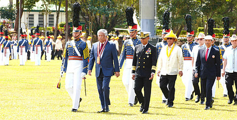 PMA Superintendent Vice Admiral Caesar Bernard Valencia leads the arrival honors for PAGCOR Chairman and CEO Alejandro Tengco (2nd from left) during the PMA Alumni Homecoming ceremony today, 15 February.