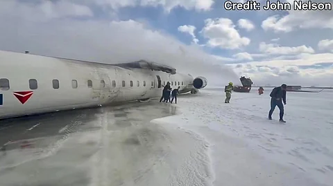Delta plane flips upside down in Toronto crash, 8 wounded