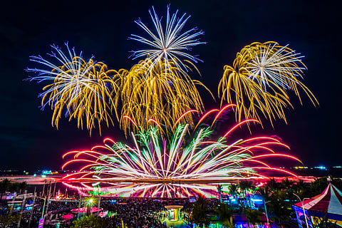 Fireworks light up the night sky as the Philippines and Austria amaze spectators at the 12th Philippine International Pyromusical Competition at SM Mall of Asia By the Bay.