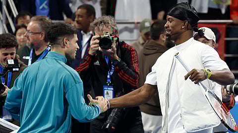 Carlos Alcaraz exchanges pleasantries with Golden State Warriors star Jimmy Butler after playing a friendly match at the sidelines of the Qatar Open.