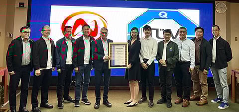 Present during the ceremonial awarding at the Meralco headquarters in Pasig City were (L-R) Meralco Senior Assistant Vice President and Head of Network Planning and Design Roberto D. Isip Jr., Meralco Vice President and Head of Revenue Assurance & Metering Services Marvin G. Gonsalves, Meralco Vice President and Head of Energy Management Sante C. Buella, Meralco Vice President and Head of Integrated Asset Management Joseph Allan C. Baltazar, First Vice President and Head of Networks Froilan J. Savet, TUV SUD Head of Academy, Business Assurance Department Maria Michelle Francesca Guanlao, TUV SUD Account Manager Chester Glenn Llanto, Meralco Vice President and Head of Networks Technology Management Jose S. Reyes Jr., Meralco Vice President and Head of Central Distribution Services Ariel G. Lucas, Meralco Senior Assistant Vice President and Head of North Distribution Services Domingo L. Robles, and Meralco Vice President and Head of Sub-Transmission Services Alberto N. Castillo.