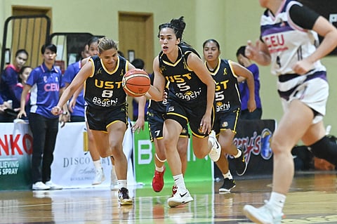 kent Pastrana and the UST Tigresses flaunt their might as they notched a 105-33 win over CEU in the WMPBL Invitational Tournament on Wednesday at the Enderun Gym.