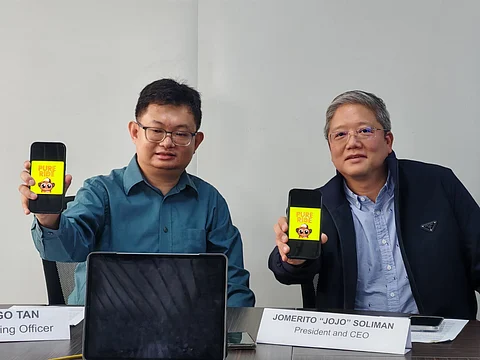 Pure Ride executives Edison Go Tan and Jomerito ‘Jojo’ Soliman proudly showcase the new ride-hailing app.