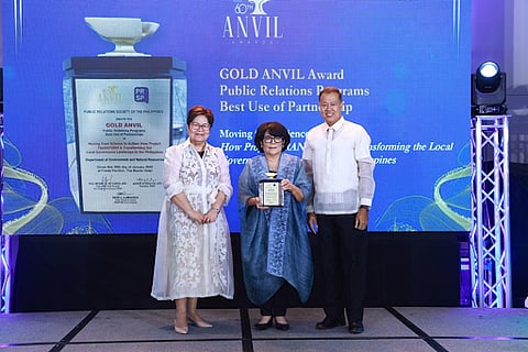 Department of Environment and Natural Resources (DENR) Secretary Maria Antonia Yulo Loyzaga (middle) receives the Gold Anvil Award given by the Public Relations Society of the Philippines for the DENR’s entry “From Science to Action: Transforming the Local Governance Landscape in the Philippines” under Public Relations Programs - Best Use of Partnerships category. The award was presented to the Secretary by DENR Undersecretary and Chief of Staff Marilou G. Erni (left) and Undersecretary Atty. Jonas R. Leones during the DENR Management Command Conference in Laguna.