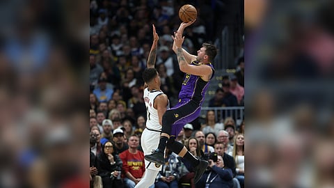 Luka Doncic fires 32 points to help the Los Angeles Lakers coast to a 123-100 victory that also snapped the Utah Jazz’s nine-game winning streak on Saturday in their NBA regular season game.