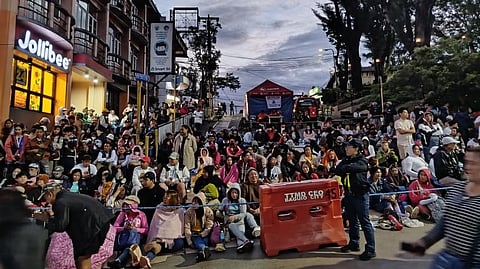 Massing up Spectators eagerly gather along Session Road as early as 5 a.m. — some even arriving in the still-dark hours — anticipating the much-awaited Grand Float Parade of the Baguio Flower Festival, famously known as Panagbenga, on Sunday.
