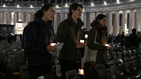 People attend a Rosary prayer for the health of Pope Francis who is hospitalized with pneumonia, at St Peter's basilica in The Vatican on 24 February 2025. Pope Francis' condition showed a "slight improvement" on 24 February 2025, the Vatican said, as the critically-ill pontiff spent his 11th day in hospital with double pneumonia. "The critical clinical conditions of the Holy Father demonstrate a slight improvement. Even today there were no episodes of asthmatic respiratory attacks; some laboratory tests have improved," said the Vatican in its evening bulletin on the 88-year-old's health.