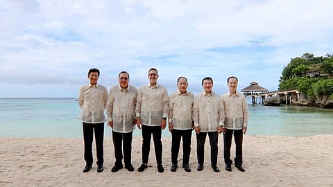 Heads of ASEAN Exchanges take a break from their meeting to pose for a photo on Boracay Island’s glimmering white sand (from left), SET president Asadej Kongsiri, IDX president director Iman Rachman, BM CEO Datuk Muhamad Umar Swift, PSE president and CEO Ramon S. Monzon, SGX Group CEO Loh Boon Chye, and VNX Deputy CEO Quang Thuong Nguyen.