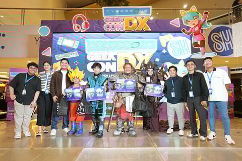 Cosplay Standouts: The winners of cosplay competition receiving recognition on stage