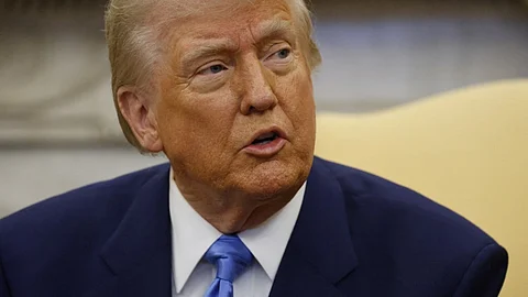 US President Donald Trump speaks during a meeting with French President Emmanuel Macron in the Oval Office of the White House in Washington, DC, on 24 February 2025.