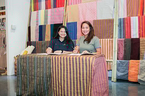 Formalizing a partnership that empowers the Filipino weaving community: (from left) Maybank Foundation Head Community Empowerment Lin Ariffin and ANTHILL Fabric Gallery co-founder and managing director Anya Lim at the ANTHILL Headquarters in Cebu City.