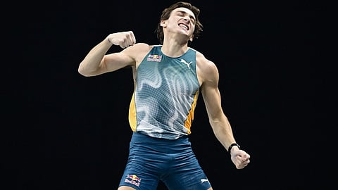 Sweden's Armand Duplantis celebrates after clearing the 6,10 metres bar during the men's pole vault event of the ISTAF Athletics Indoor Meeting 2025 in Berlin on 14 February 2025.